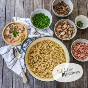Baked risotto with chicken, bacon, mushrooms, peas and thyme